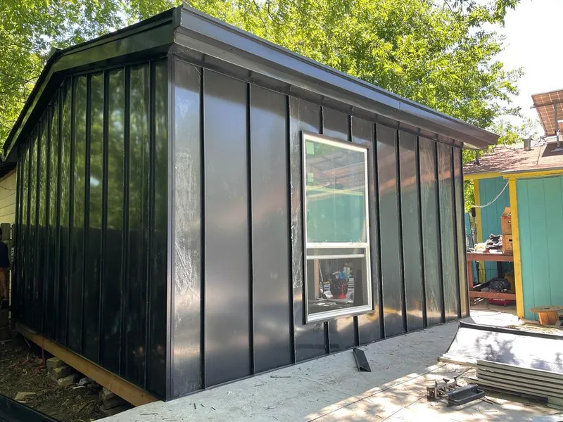 Black standing seam metal wall panels for Metal Roof Installation in Babylon