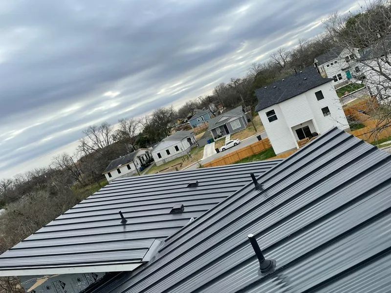 Standing seam metal roof panels with vents for Skylight Repair in Babylon